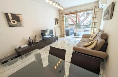 Coin salon dans l'établissement LACOUR7 Palmes dProperties