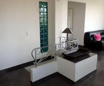 Coin salon dans l'établissement Villa de charme 5 pièces vue mer