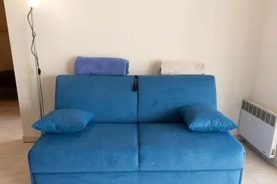 Coin salon dans l'établissement Charming Apartment in Cannes 10-min to beach