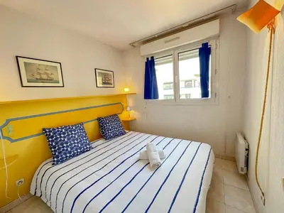 Un ou plusieurs lits dans un hébergement de l'établissement Charming Apartment in Cannes 10-min to beach