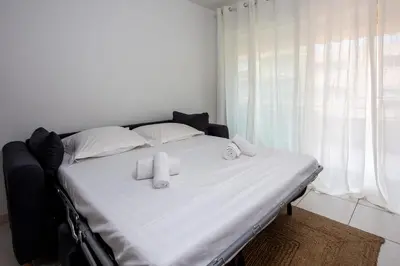 Un ou plusieurs lits dans un hébergement de l'établissement Appartement Antibéa - Welkeys