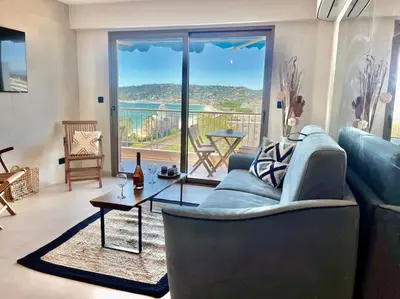 Coin salon dans l'établissement Luxury sea view
