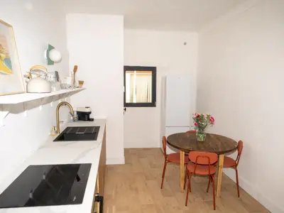 Cuisine ou kitchenette dans l'établissement La maison by Simone T3