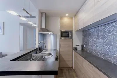 Cuisine ou kitchenette dans l'établissement Amandier du Moure Rouge