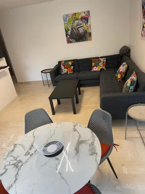 Coin salon dans l'établissement Parc Baie des Anges