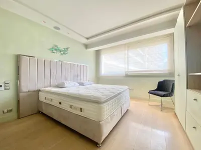 Un ou plusieurs lits dans un hébergement de l'établissement Grand Hotel 2 chambres 2 sdb - GH