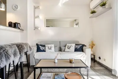 Coin salon dans l'établissement Home Sweet Home