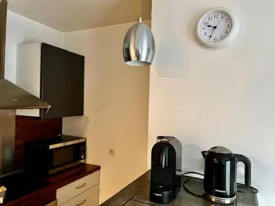 Cuisine ou kitchenette dans l'établissement Home Sweet Home