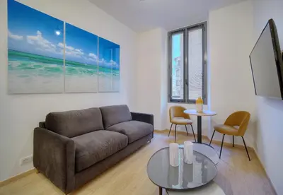 Coin salon dans l'établissement TOP renovated 1 bedroom near Palais 2P1 by RIVAEVENT
