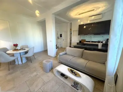 Coin salon dans l'établissement Appartement T3 grand standing à Juan Les Pins