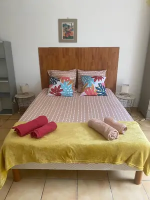 Un ou plusieurs lits dans un hébergement de l'établissement Villeneuve loubet studio Cigalou