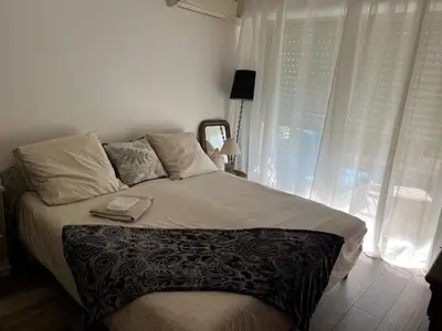 Un ou plusieurs lits dans un hébergement de l'établissement Chambre cosy dans T3