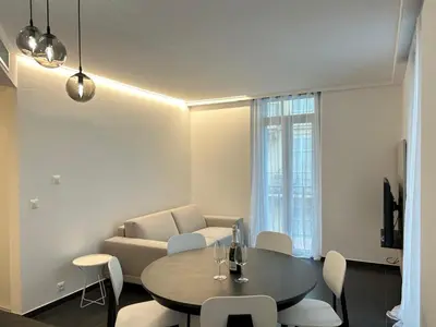 Coin salon dans l'établissement Design 2 pièces CARRE D'OR -COEUR DE CANNES A1B205