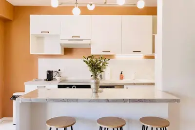 Cuisine ou kitchenette dans l'établissement Le Calmette - Logement Confort Centre Cannes