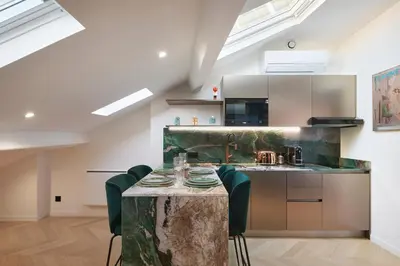 Cuisine ou kitchenette dans l'établissement Le XV Cannes