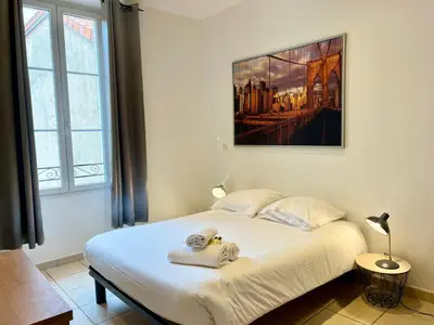 Un ou plusieurs lits dans un hébergement de l'établissement Viva Riviera Residence Rue Florian close Croisette