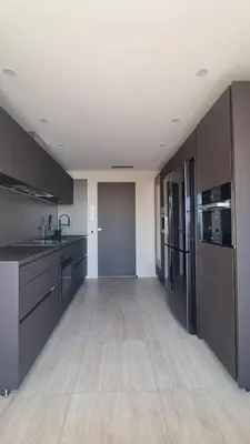 Cuisine ou kitchenette dans l'établissement Lux- Apartment at Marina baie des Anges - with Panoramic Sea View