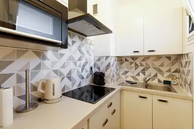 Cuisine ou kitchenette dans l'établissement Studio très spacieux et Design LE BELLA Climatisé