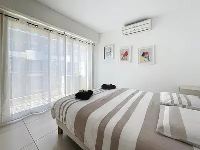 Un ou plusieurs lits dans un hébergement de l'établissement 57m2 - 2 chambres, terrasse, Croisette-Martinez