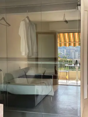 Un ou plusieurs lits dans un hébergement de l'établissement Appartement Design élégant
