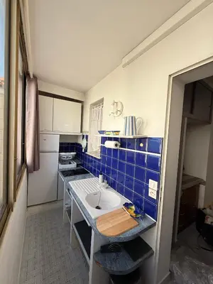 Cuisine ou kitchenette dans l'établissement Palm Beach Escape