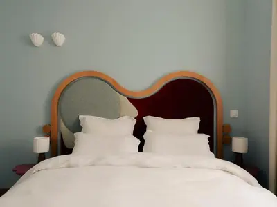 Un ou plusieurs lits dans un hébergement de l'établissement Edgar Suites Cannes - Rue d'Antibes