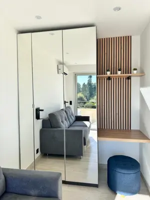 Coin salon dans l'établissement STUDIO HORIZON - SEA VIEW - POOL- Air Conditioner - Kitchen - Wifi -TV Train - Bus -