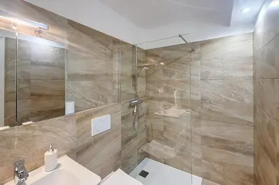Salle de bains dans l'établissement Henri Camille Real Estate- Mikaela - Studio with terrace