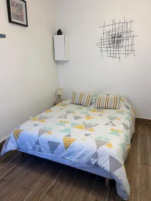 Un ou plusieurs lits dans un hébergement de l'établissement Studio ANTIBES CENTRE
