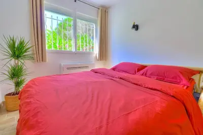 Un ou plusieurs lits dans un hébergement de l'établissement Charmant Studio rénové à Antibes, plage à 10 min à pied