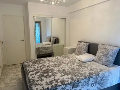 Un ou plusieurs lits dans un hébergement de l'établissement Appartement T2 bord de mer