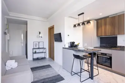 Cuisine ou kitchenette dans l'établissement Studio Jules - Bd de Lorraine