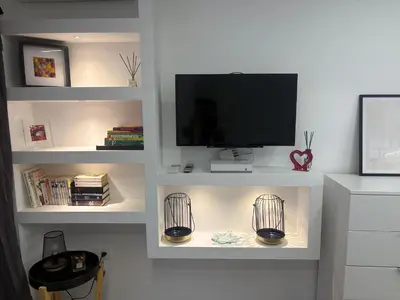 Télévision ou salle de divertissement dans l'établissement studio Pointe Croisette avec terrasse