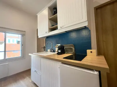 Cuisine ou kitchenette dans l'établissement Rêve Bleu SCLS - Wifi, Centre-Ville