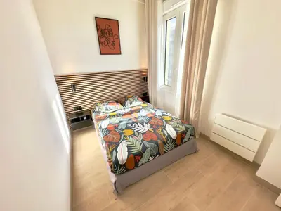 Un ou plusieurs lits dans un hébergement de l'établissement Cosy Home Cannes - Croisette