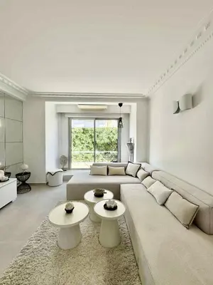 Coin salon dans l'établissement Apt moderne et luxueux a Cannes Res Miramar