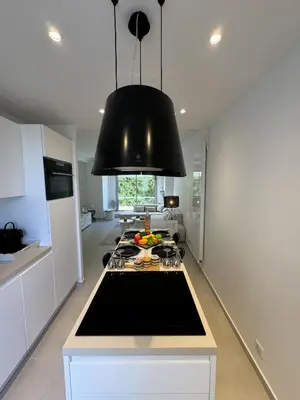 Cuisine ou kitchenette dans l'établissement Apt moderne et luxueux a Cannes Res Miramar