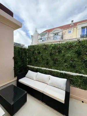 Coin salon dans l'établissement Apt moderne et luxueux a Cannes Res Miramar