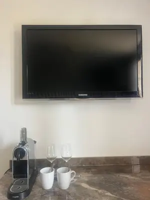 Télévision ou salle de divertissement dans l'établissement Villa Gabriel