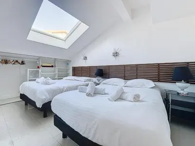Un ou plusieurs lits dans un hébergement de l'établissement INTUITION - Cannes centre - 6-8 Couchages