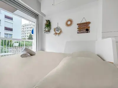 Un ou plusieurs lits dans un hébergement de l'établissement Studio lumineux, WIFI à deux pas de la Croisette