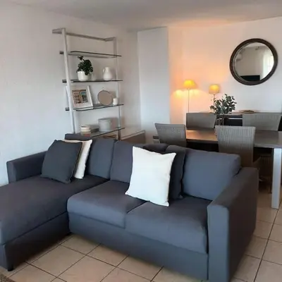 Coin salon dans l'établissement Apt calme 2 chambres vue dégagée
