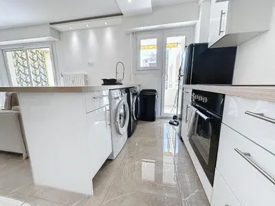 Cuisine ou kitchenette dans l'établissement INTUITION - 3 pieces - 10min Croisette