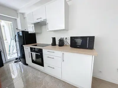 Cuisine ou kitchenette dans l'établissement INTUITION - 3 pieces - 10min Croisette