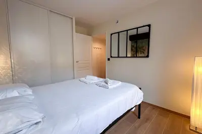 Un ou plusieurs lits dans un hébergement de l'établissement MACE Appartement avec SPA dans quartier Historique Exclusif Calme Coeur d'Antibes