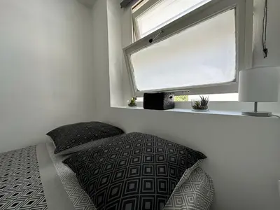 Un ou plusieurs lits dans un hébergement de l'établissement Appartement cosy à 2 pas de la Croisette