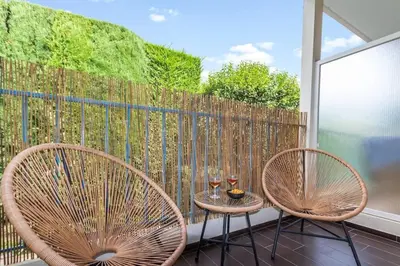Balcon ou terrasse dans l'établissement L'Emeraude - Calme - Plage - WIFI
