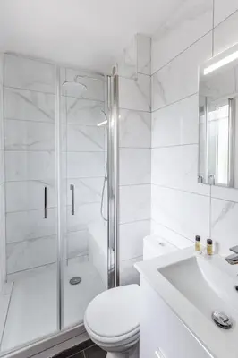 Salle de bains dans l'établissement L'Emeraude - Calme - Plage - WIFI