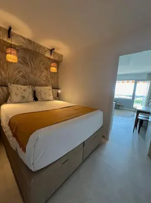 Un ou plusieurs lits dans un hébergement de l'établissement Appartement de charme, 2P, Terrasse, Vue mer, Clim, Garage