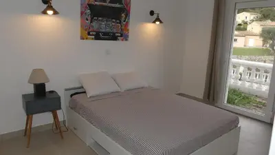 Un ou plusieurs lits dans un hébergement de l'établissement Bas de villa prestations haut de gamme